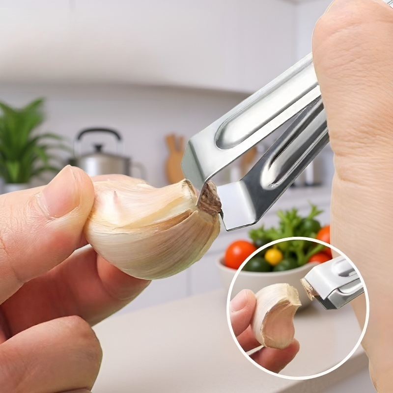 Garlic peeler in use with fresh garlic