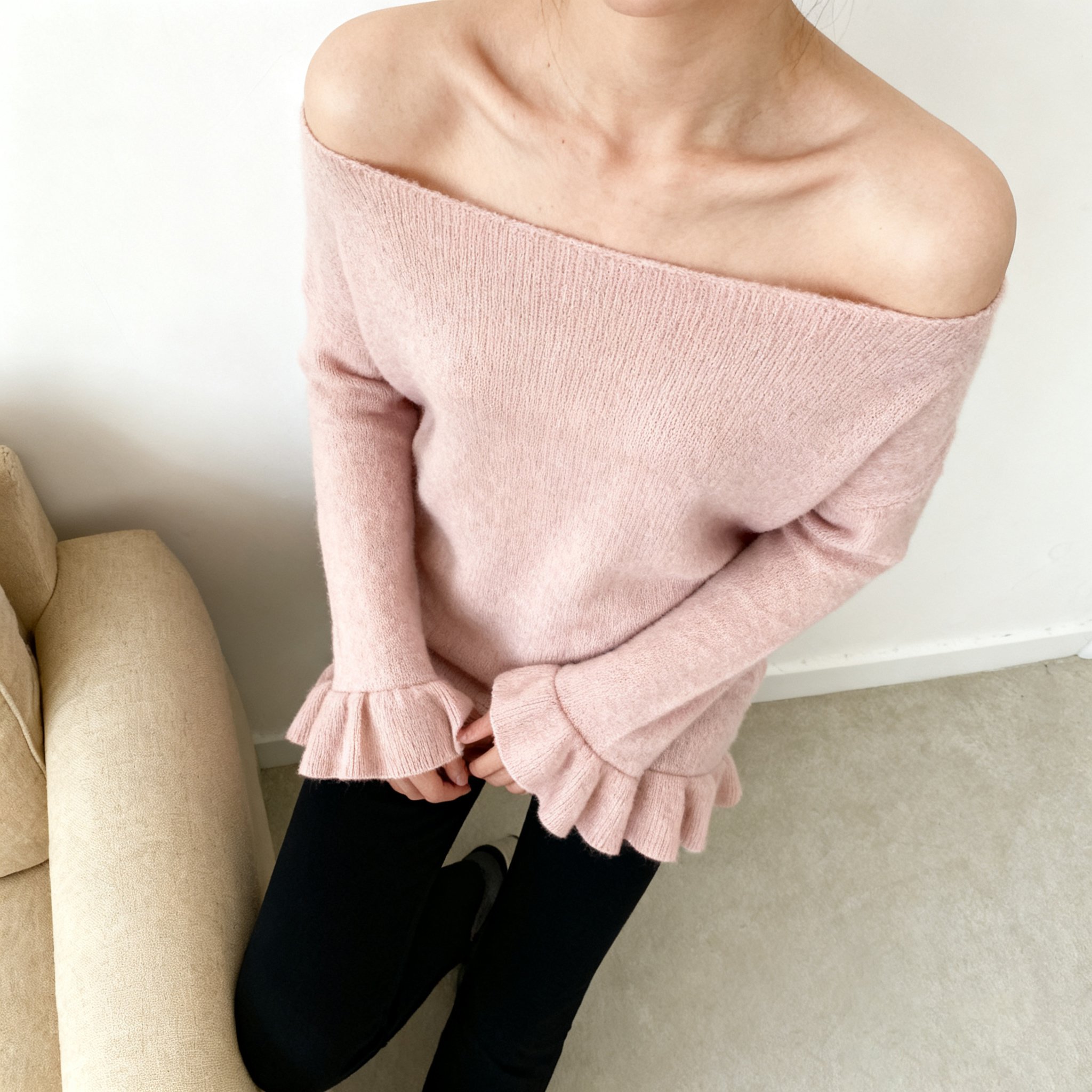フェミニンなラッフルスリーブのディテール