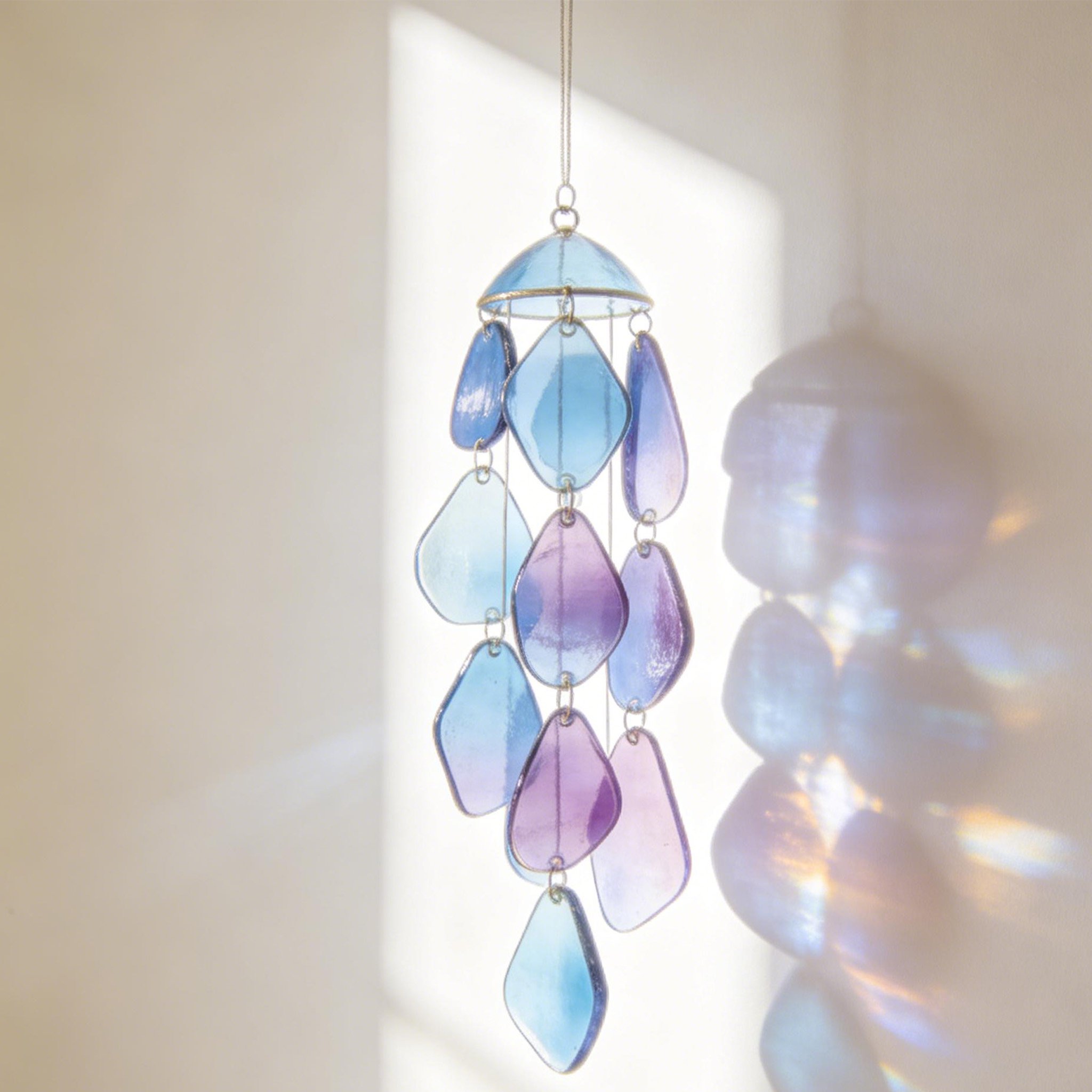 Elegant wind chime hanging in a cozy living room