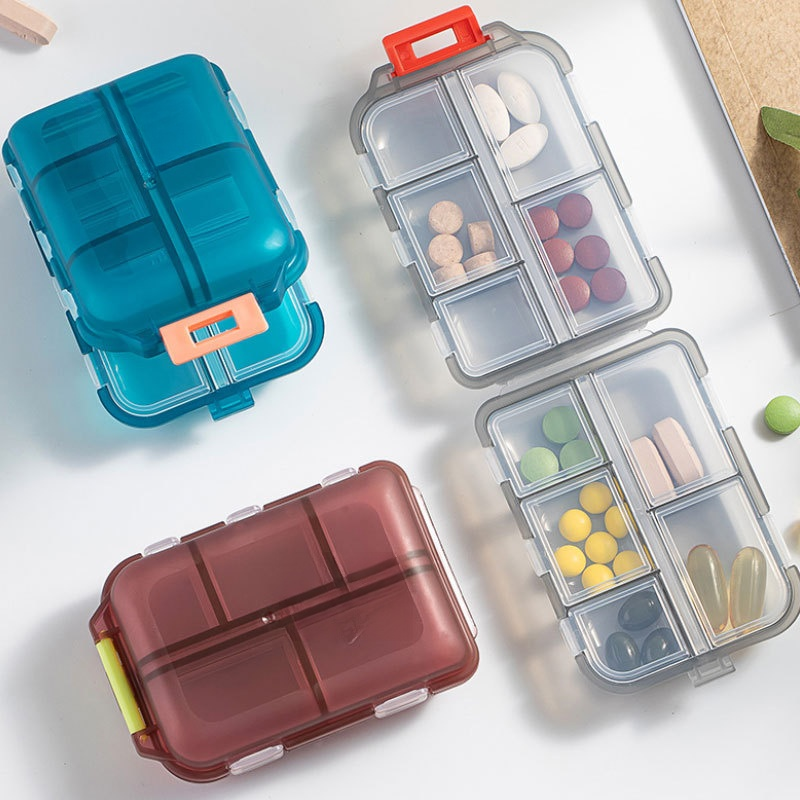 Portable transparent 10-compartment sealed pill box