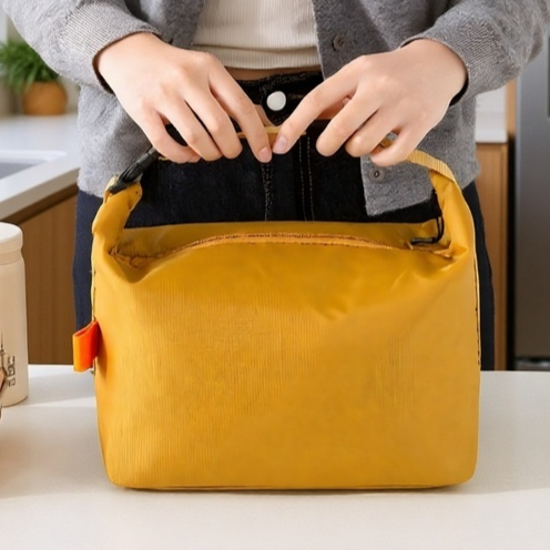 Vista lateral de la bolsa de picnic térmica