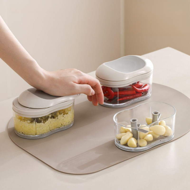 Multi-functional manual garlic mincer