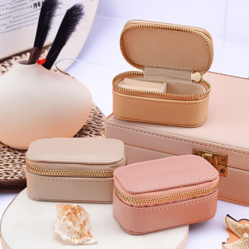 Portable Mini Jewelry Organizer open with earrings and rings inside