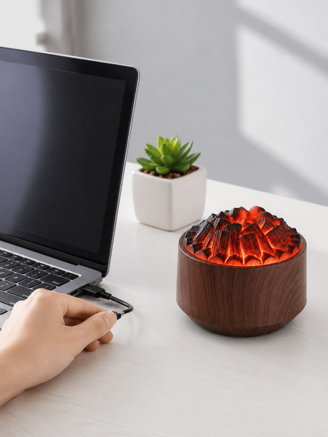 Small flame effect diffuser releasing mist