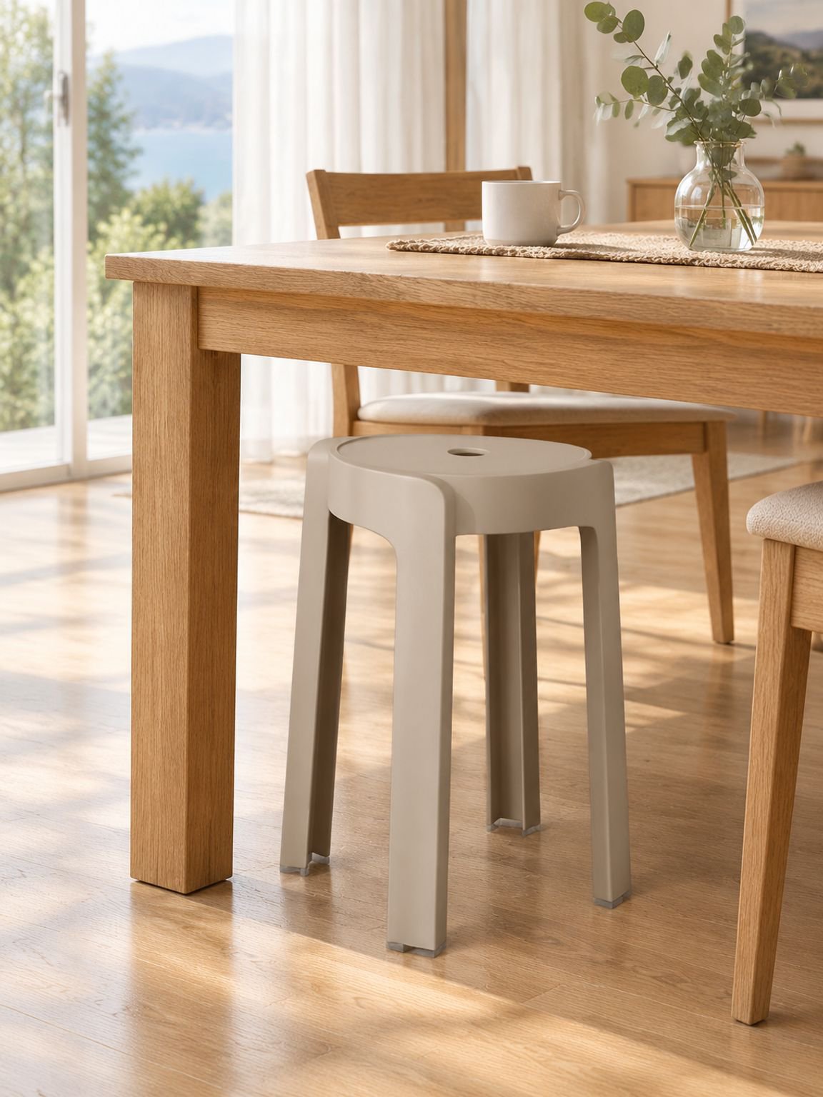 Modern minimalist plastic stool styled in a contemporary home