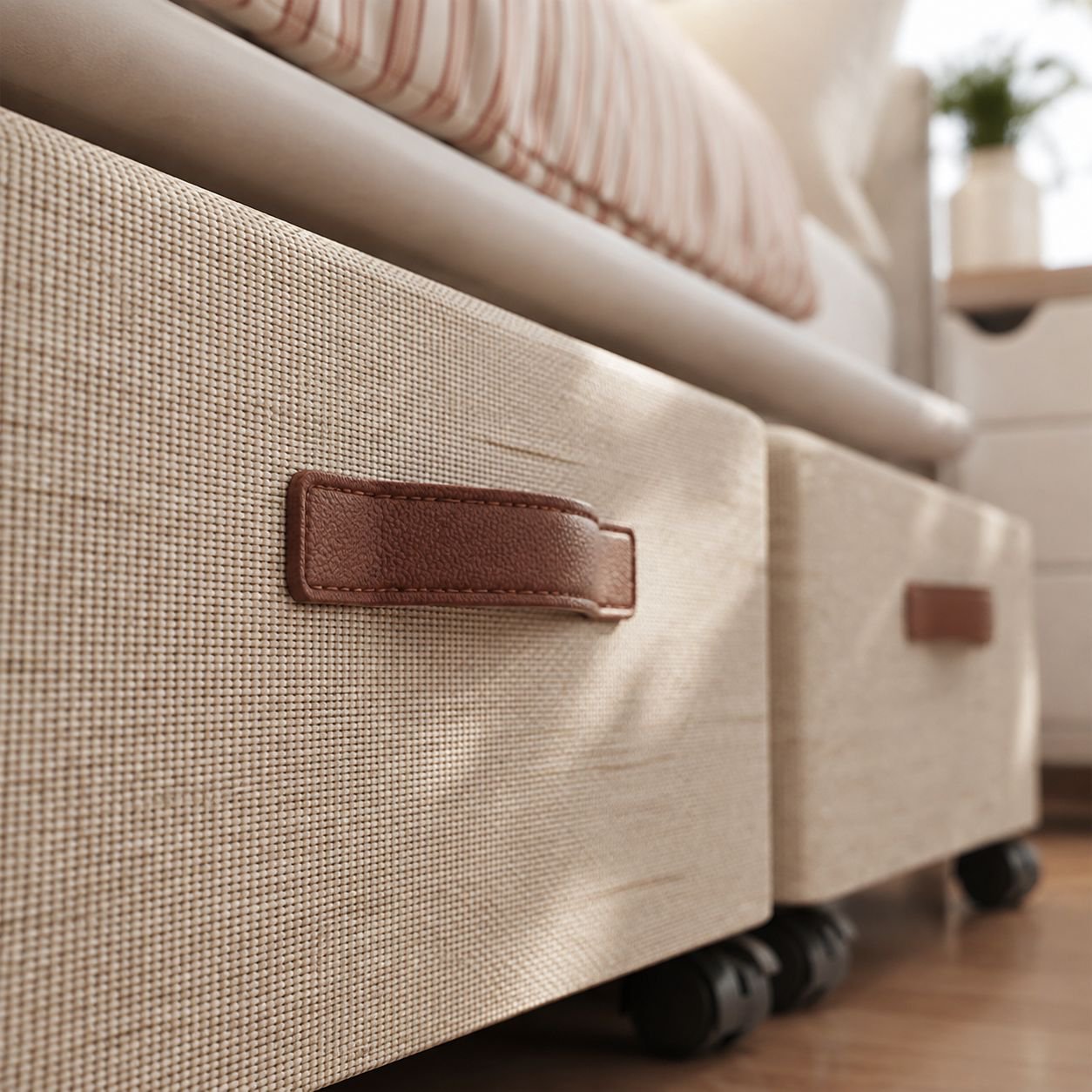 Under-bed storage bin with smooth rolling wheels