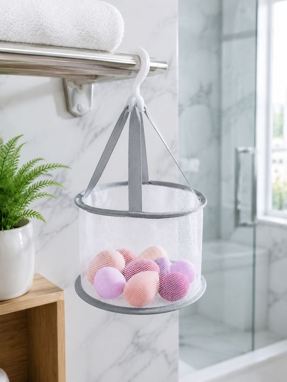 Portable mesh clothes drying bag hanging in use