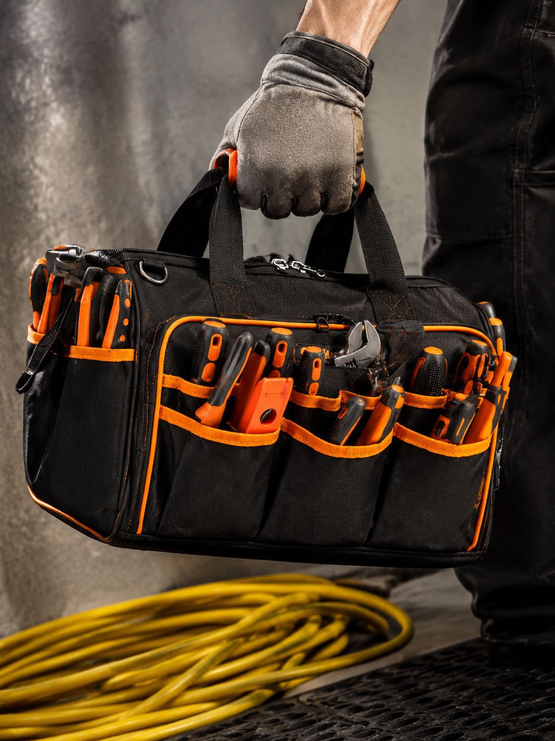 Wide open-mouth design for easy access to tools in the electrician's bag