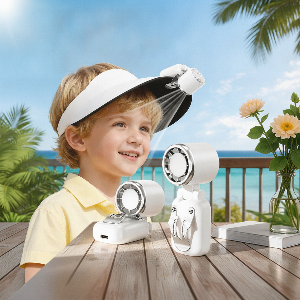 Compact USB fan clipped to hat brim
