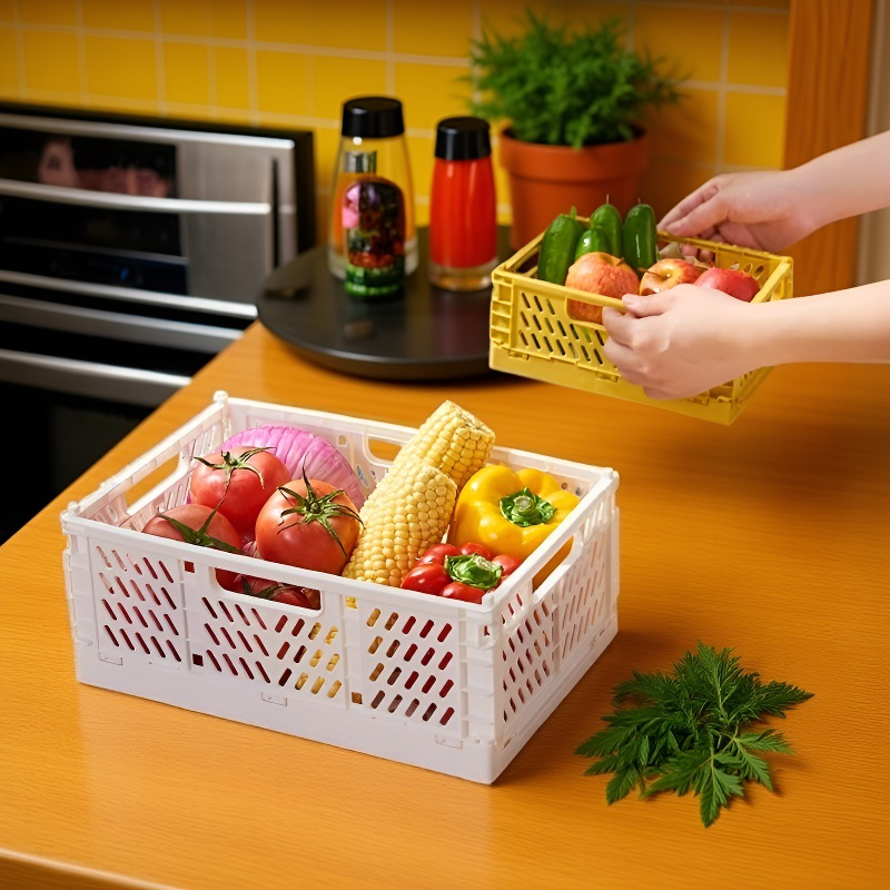 Caja de almacenamiento plegable de plástico con asas para fácil transporte