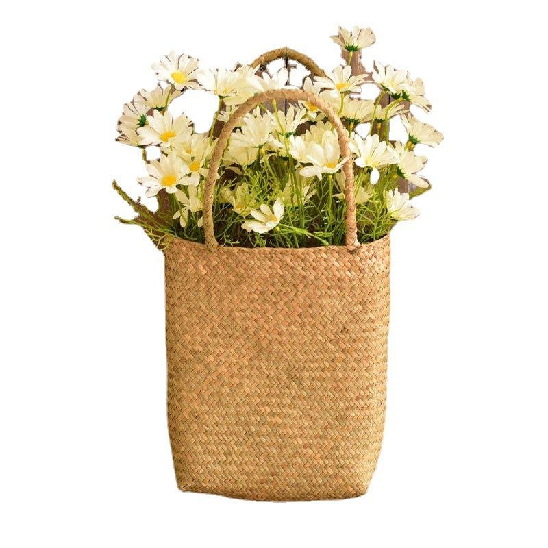 Panier à fleurs tressé en herbe de mer avec poignée