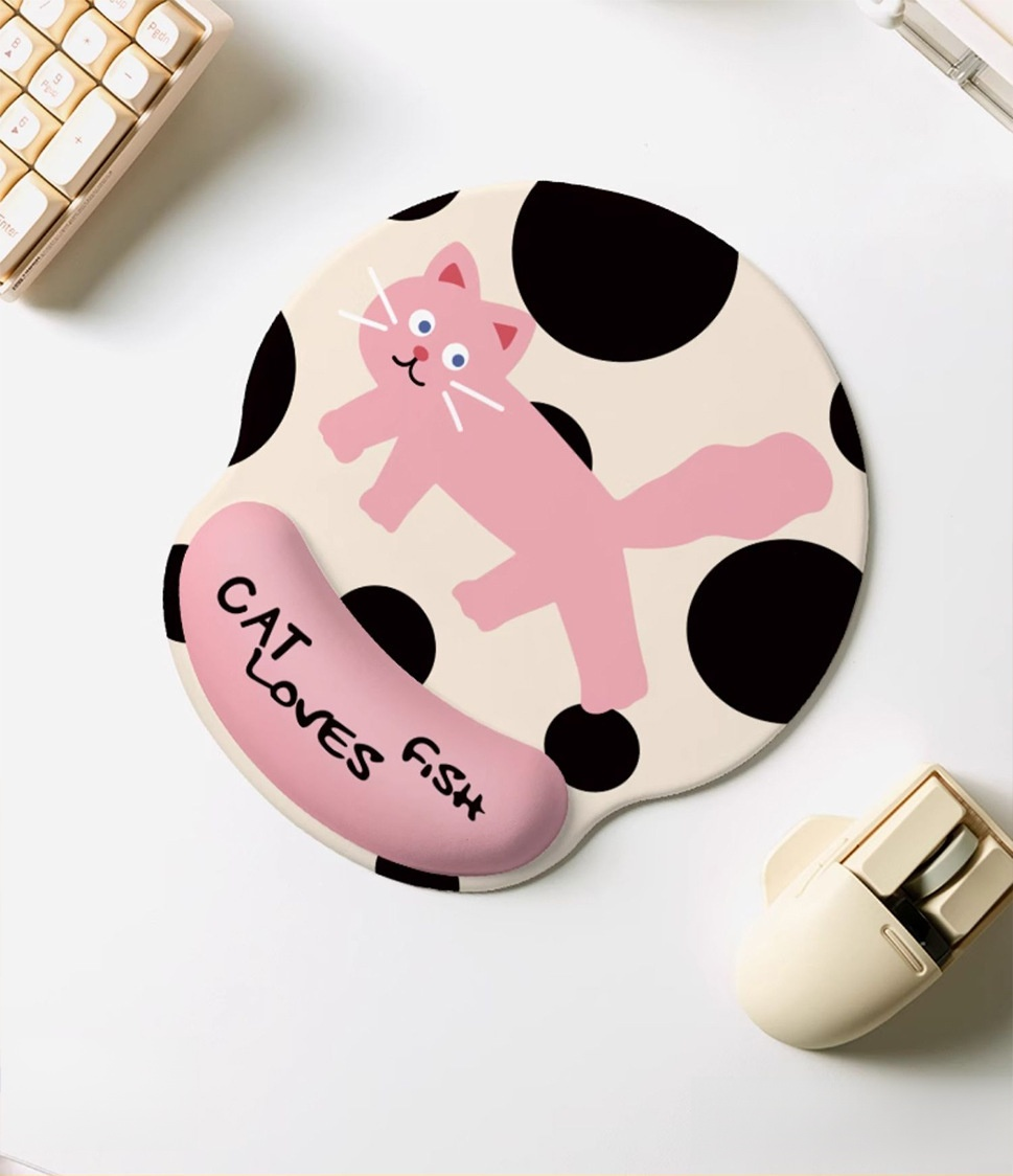 Close-up of rubber wrist support on pink cat mouse pad