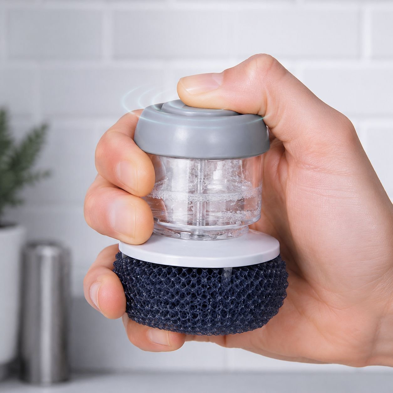 Kitchen brush with built-in soap dispenser on white background