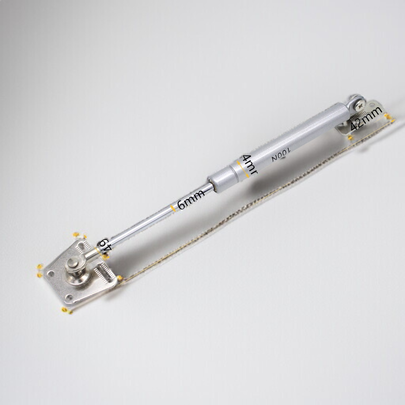 キャビネットドアに取り付けた油圧サポート棒