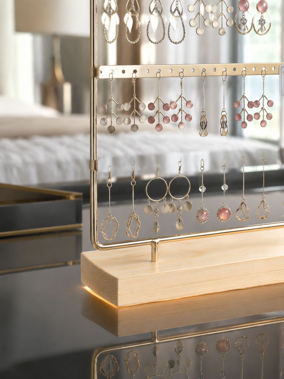 Wrought iron jewelry rack with multiple earring slots