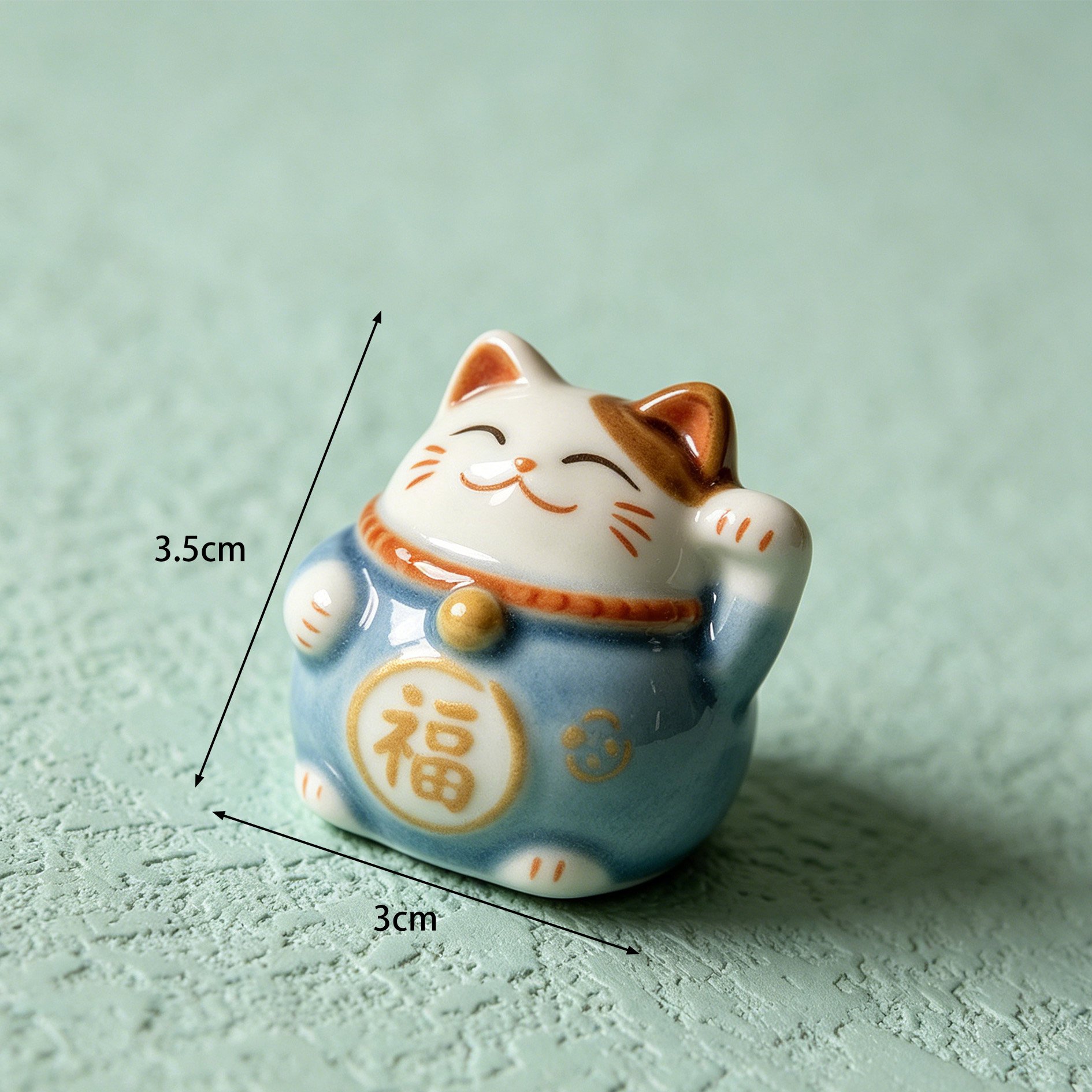 Japanese lucky cat miniatures on a decorative tray