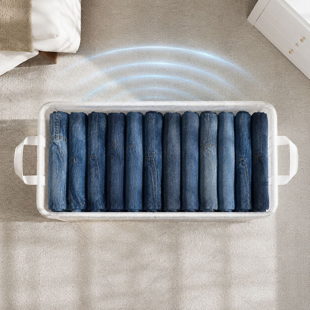 Clear stackable boxes storing folded shirts