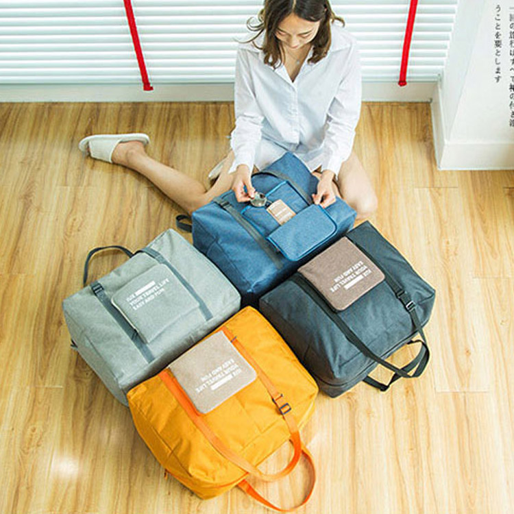 กระเป๋าเดินทางแบบถือความจุเยอะกันน้ำได้