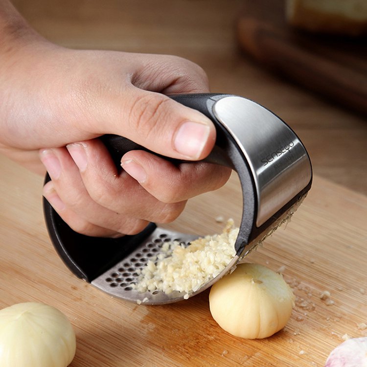 Hand-Held Garlic Press