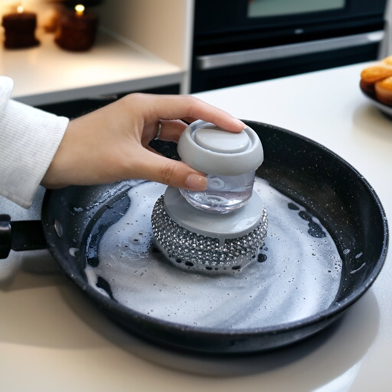 Household dish brush featuring a built-in sponge and wire ball